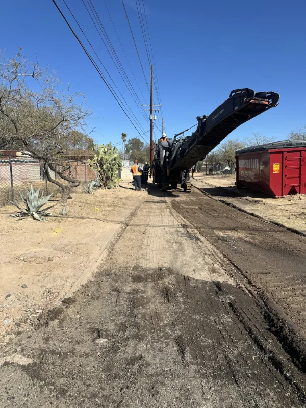 Photo of TAC employees preparing road for paving